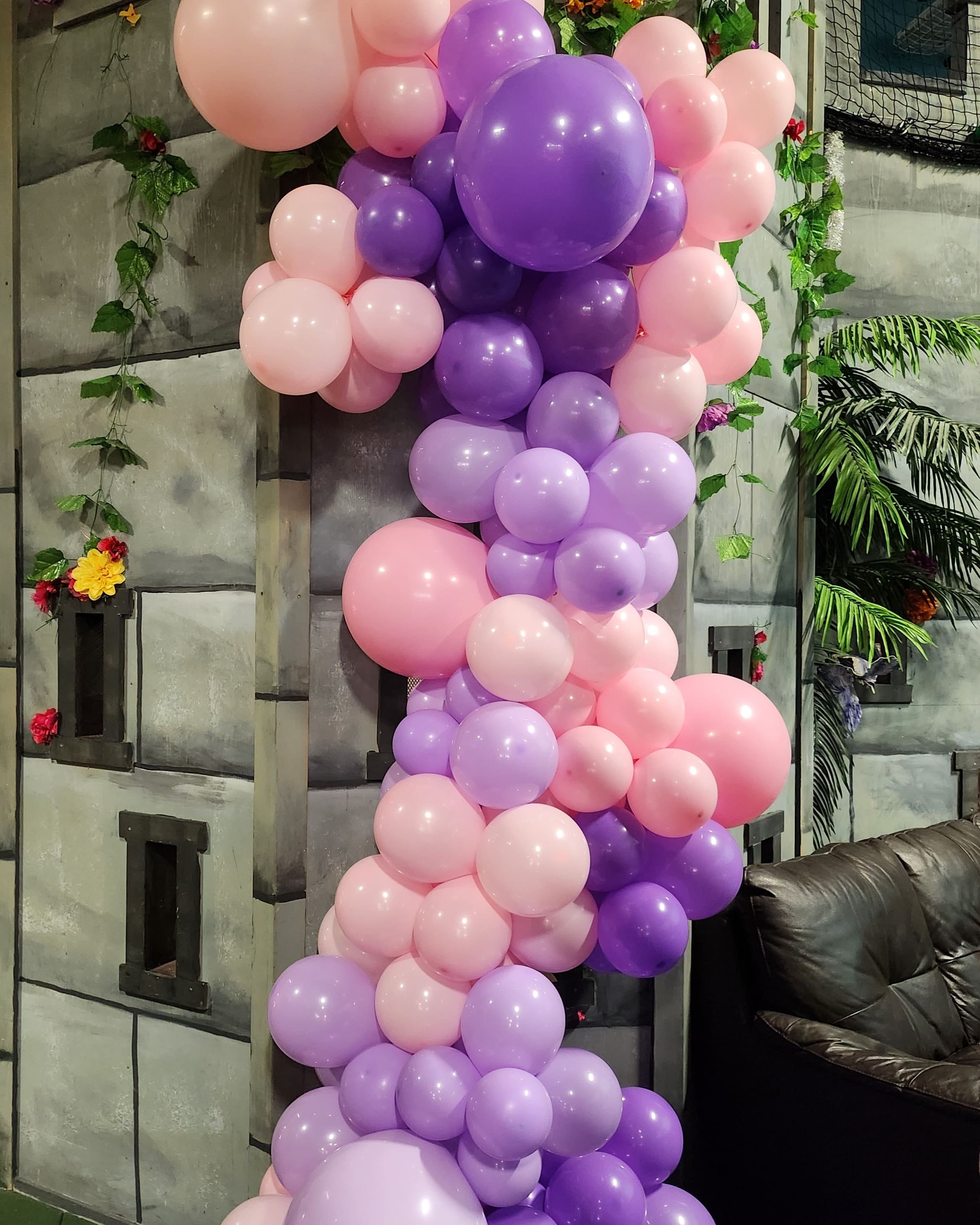 Pink and purple balloon garland column decoration